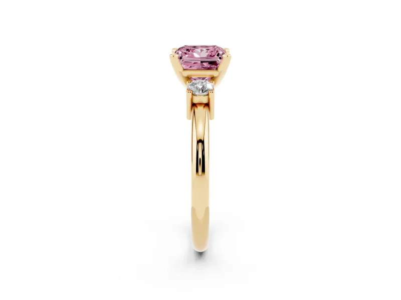 Fancy Pink Three-Stone Princess Cut Diamond Ring Set in Yellow gold with Prong Setting and Plain Band