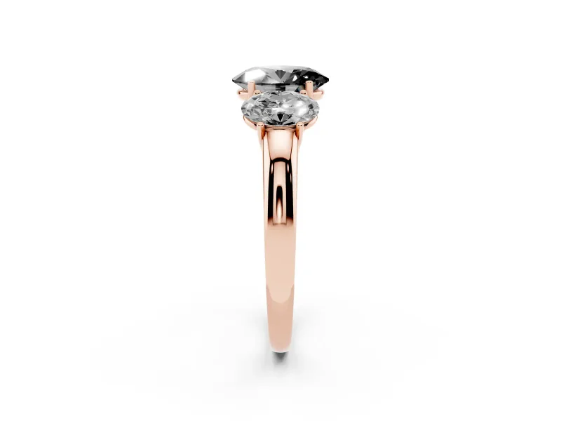 Fancy Black Oval Cut Diamond Three-Stone Ring Set in Rose gold with Bold Center and Classic Band