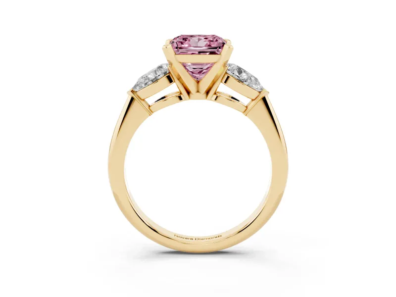 Fancy Pink Three-Stone Princess Cut Diamond Ring Set in Yellow gold with Pear Side Stones and Prong Setting