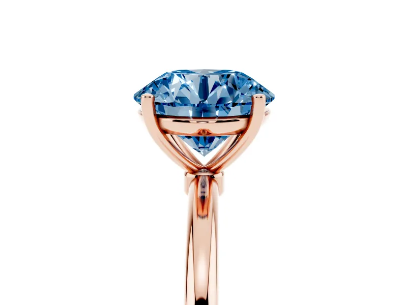 Fancy Blue Round Cut Diamond Solitaire Engagement Ring Set in Rose gold with Thin Band and Prong Setting