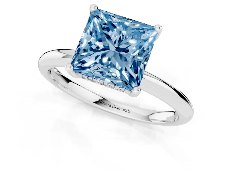 Fancy Blue Princess Cut Diamond Solitaire Engagement Ring Set in White gold with Prong Setting and Polished Band