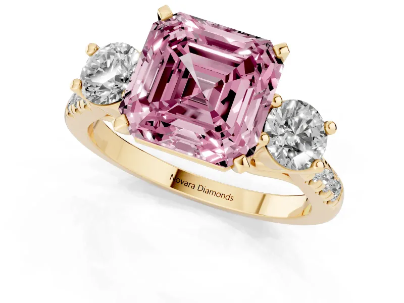 Fancy Pink Three-Stone Asscher Cut Diamond Pavé Band Ring Set in Yellow gold with Prong-Set Trio
