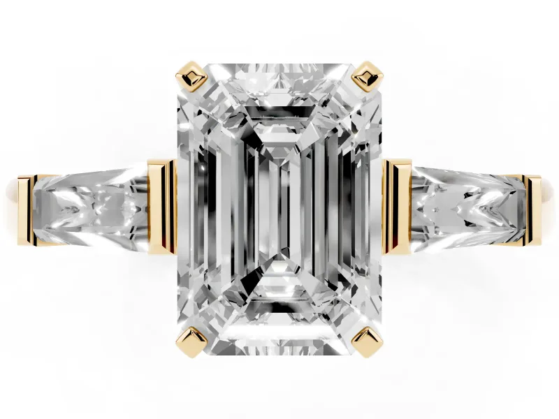 Emerald Cut Diamond Solitaire Ring Set in Yellow gold with Tapered Baguette Side Stones and Prong Setting