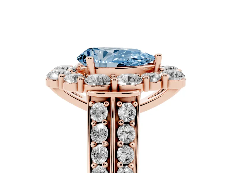 Fancy Blue Pear Cut Diamond Halo Engagement Ring Set in Rose gold with Split Shank and Prong Setting