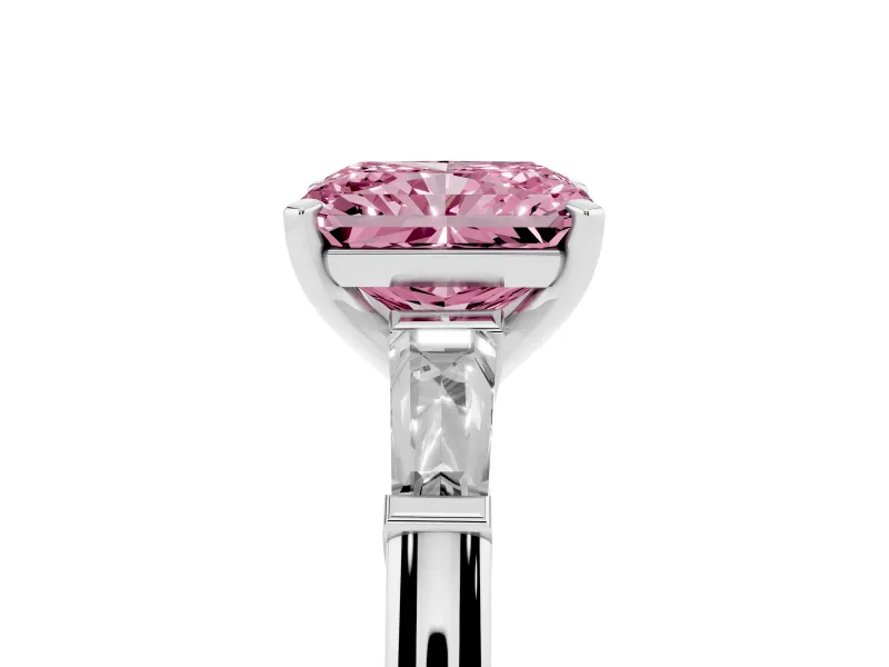 Fancy Pink Radiant Cut Diamond Solitaire Ring Set in Platinum with Tapered Baguette Side Stones and Prong Setting