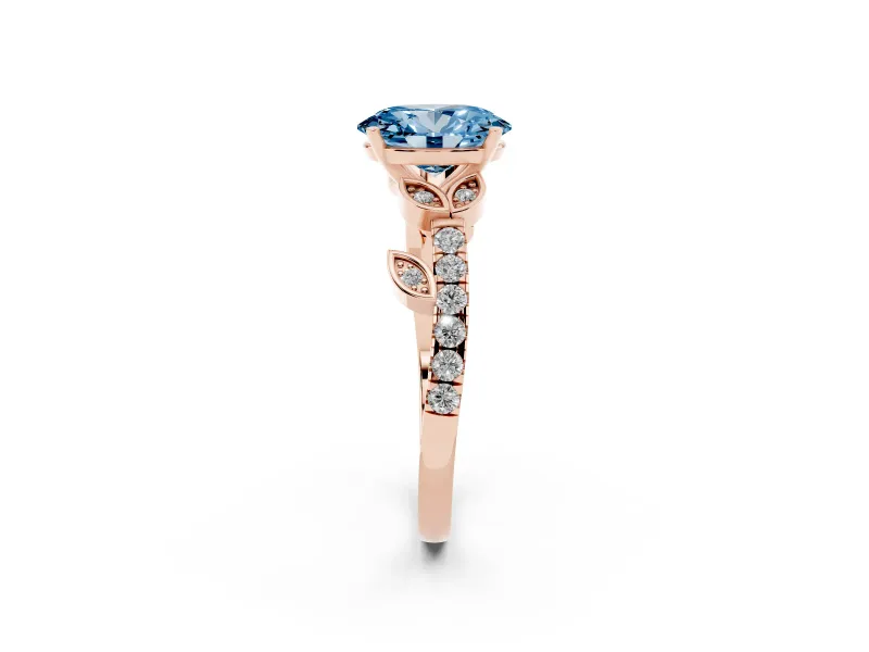 Fancy Blue Oval Cut Diamond Solitaire Leaf-Inspired Ring Set in Rose gold with Pavé Band and Prong Setting