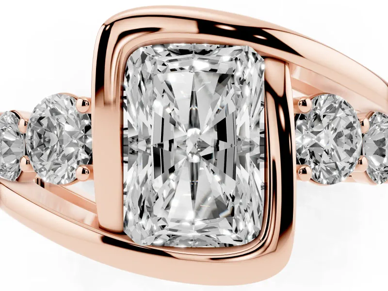 Radiant Cut Diamond Bezel Bypass Ring Set in Rose gold with Round Accents