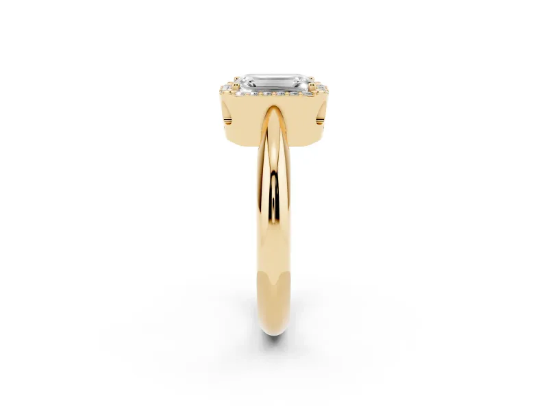 Emerald Cut Diamond Halo Engagement Ring Set in Yellow gold with Plain Split Shank and Prong Setting
