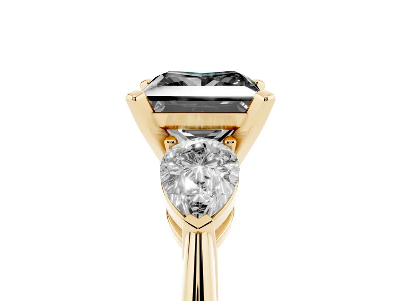 Fancy Black Three-Stone Princess Cut Diamond Ring Set in Yellow gold with Pear Side Stones and Prong Setting