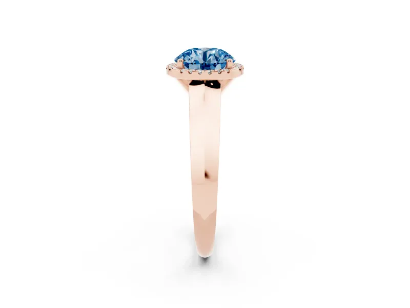 Fancy Blue Round Cut Diamond Halo Ring Set in Rose gold with Cathedral Band and Prong Setting