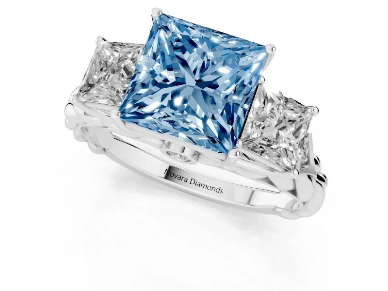Fancy Blue Princess Cut Diamond Three-Stone Ring Set in Platinum with Braided Band