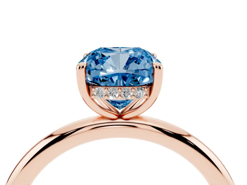 Fancy Blue Cushion Cut Diamond Solitaire Ring Set in Rose gold with Thin Band and Prong Setting