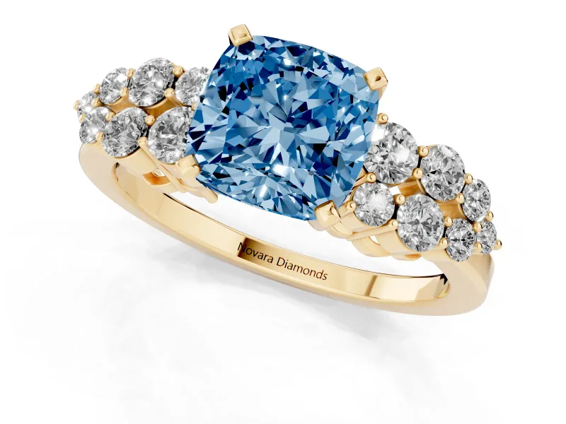 Fancy Blue Cushion Cut Diamond Cluster Engagement Ring Set in Yellow gold with Pavé Band and Prong Setting