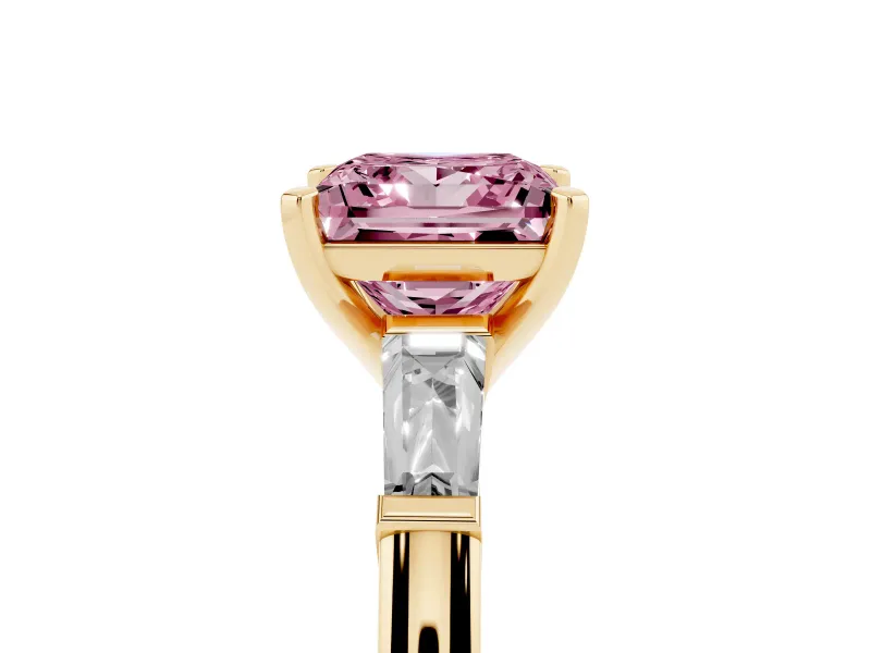 Fancy Pink Princess Cut Diamond Solitaire Ring Set in Yellow gold with Tapered Baguette Side Stones and Prong Setting