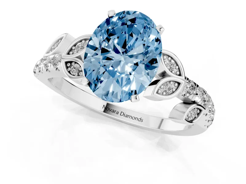Fancy Blue Oval Cut Diamond Solitaire Leaf-Inspired Ring Set in Silver with Pavé Band and Prong Setting