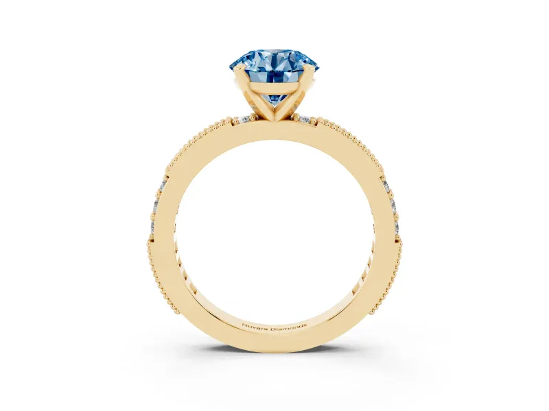 Fancy Blue Round Cut Diamond Solitaire Ring Set in Yellow gold with Slim Pavé Band and Prong Setting