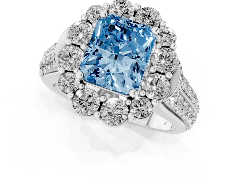 Fancy Blue Radiant Cut Diamond Halo Engagement Ring Set in White gold with Split Shank and Prong Setting