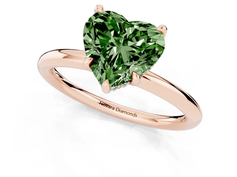Fancy Green Heart Cut Diamond Solitaire Ring Set in Rose gold with Thin Band and Prong Setting