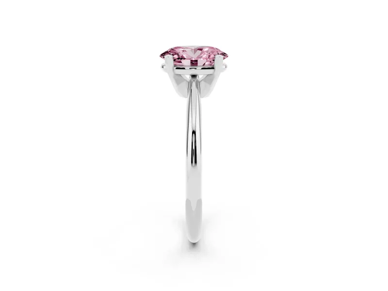 Fancy Pink Oval Cut Diamond Solitaire Ring Set in Platinum with Prong Setting on a Plain Round Band