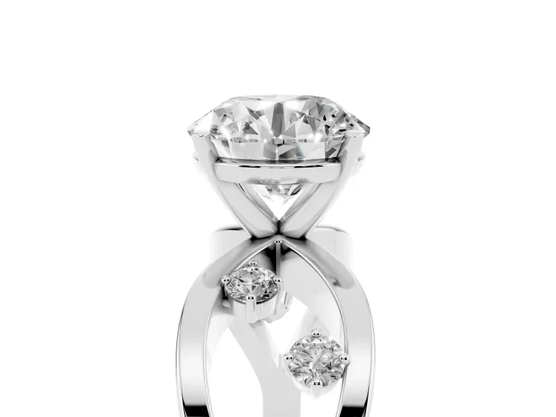Round Cut Diamond Solitaire Ring Set in White gold with Side Stones on Criss-Cross Band and Prong Setting