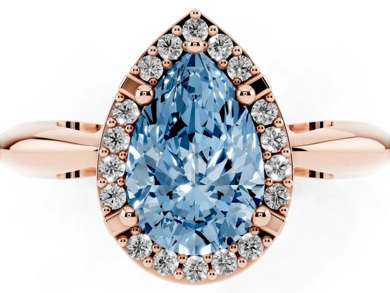 Fancy Blue Pear Cut Diamond Halo Engagement Ring Set in Rose gold with Plain Split Shank and Prong Setting