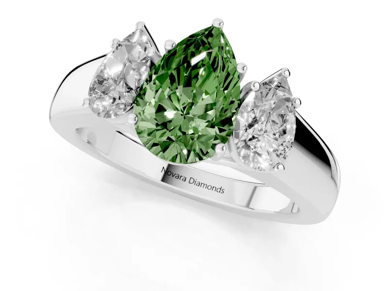 Fancy Green Three-Stone Pear Cut Diamond Ring Set in Platinum with Matching Prong Settings and Plain Band