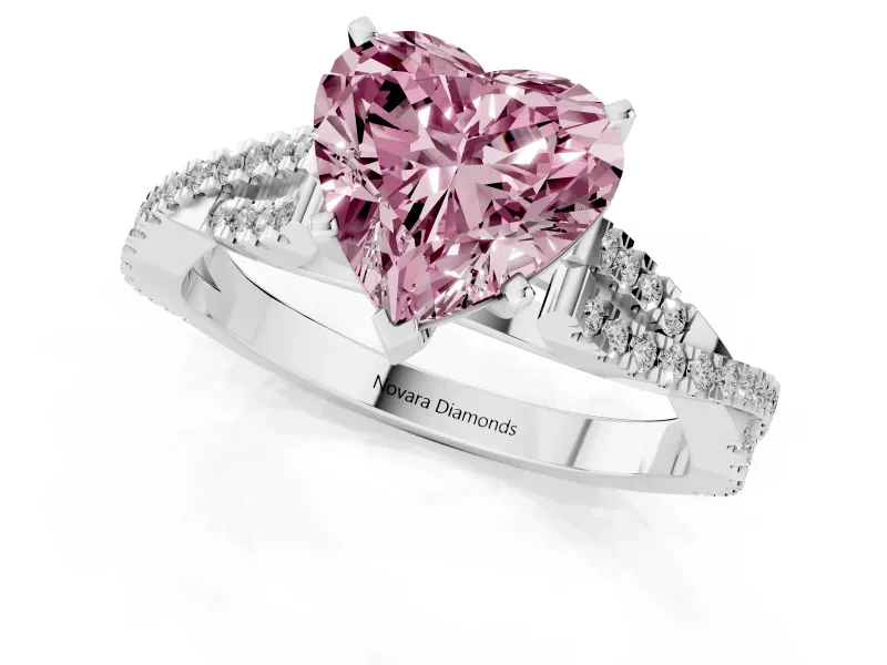 Fancy Pink Heart Cut Diamond Solitaire Engagement Ring Set in White gold with Twisted Pavé Band and Prong Setting