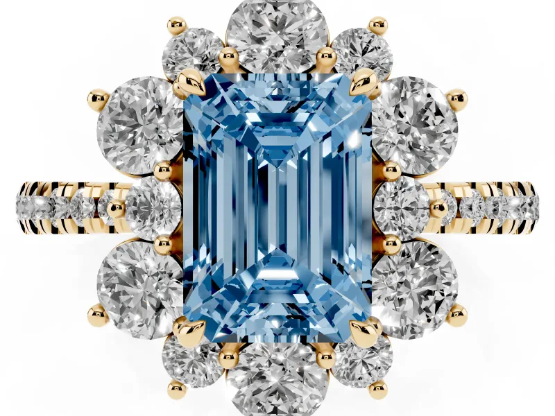 Fancy Blue Emerald Cut Diamond Floral Halo Ring Set in Yellow gold with Round Pavé Band and Prong Setting