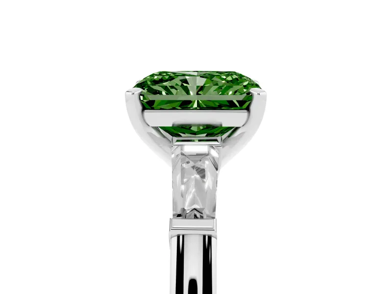 Fancy Green Radiant Cut Diamond Solitaire Ring Set in Platinum with Tapered Baguette Side Stones and Prong Setting