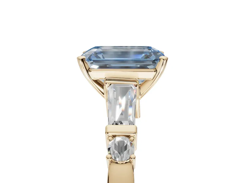 Emerald Cut Tapered Baguette Engagement Ring Setting for a Fancy Blue Lab-Grown Diamond | Bar Set Sides | Yellow Gold