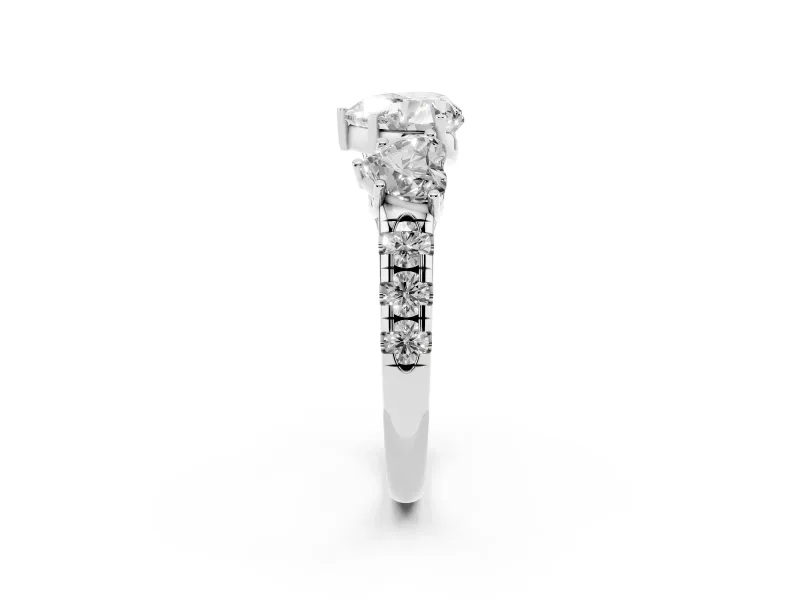 Heart Cut Diamond Three-Stone Ring Set in White gold with Pavé Band