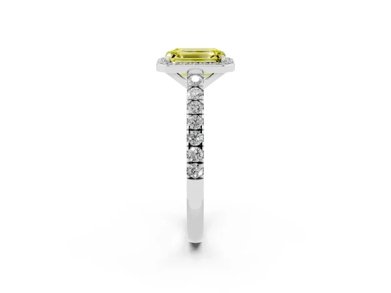 Fancy Yellow Emerald Cut Diamond Halo Engagement Ring Set in Silver with Pavé Band and Prong Setting