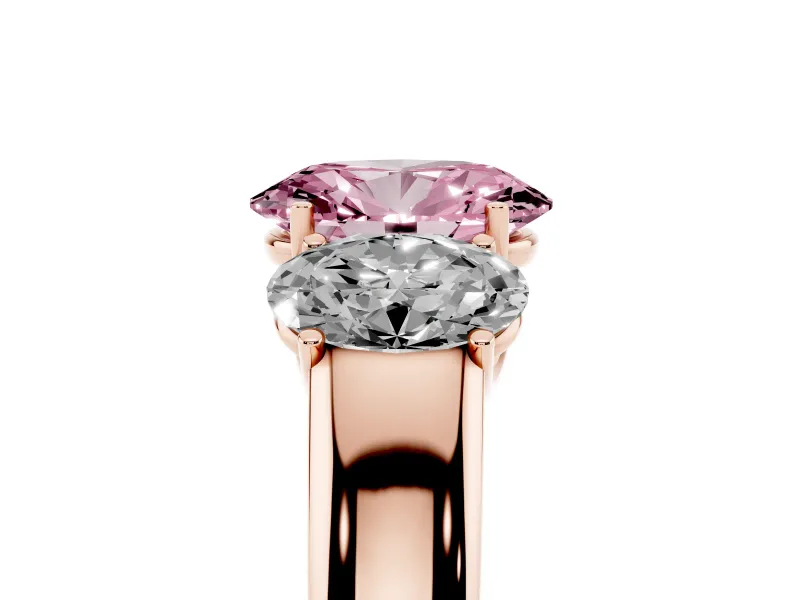 Fancy Pink Three-Stone Oval Cut Diamond Ring Set in Rose gold with Matching Prong Settings and Plain Band