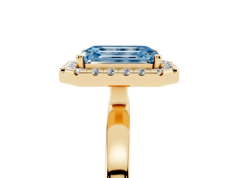 Fancy Blue Emerald Cut Diamond Halo Solitaire Ring Set in Yellow gold with Pavé Band and Prong Setting