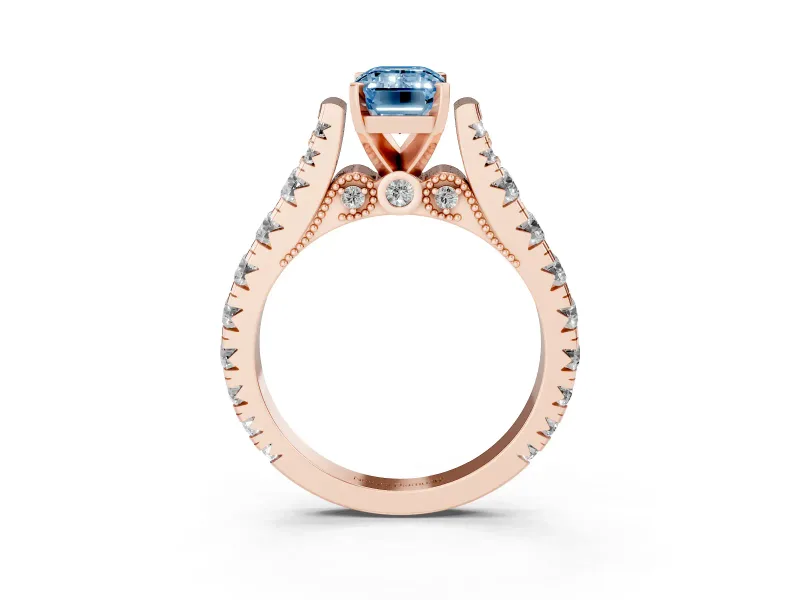 Fancy Blue Emerald Cut Diamond Classic Solitaire Ring Set in Rose gold with Pavé Band and Prong Setting