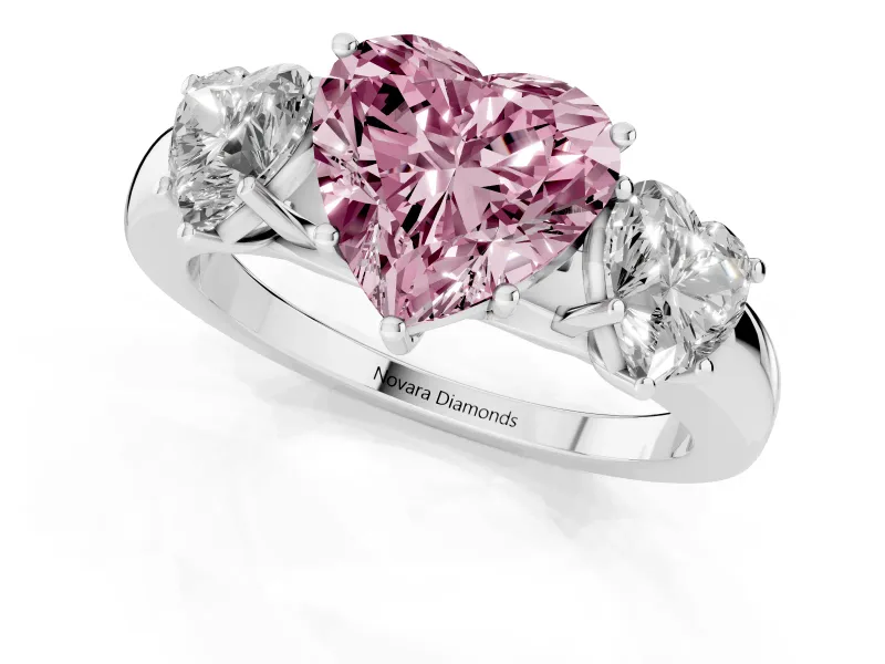 Fancy Pink Heart Cut Diamond Three-Stone Ring Set in White gold with Bold Center and Classic Band