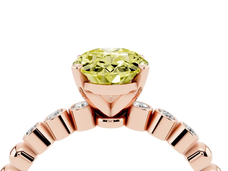 Fancy Yellow Oval Cut Diamond Solitaire Engagement Ring Set in Rose gold with Bezel Accents on Beaded Band