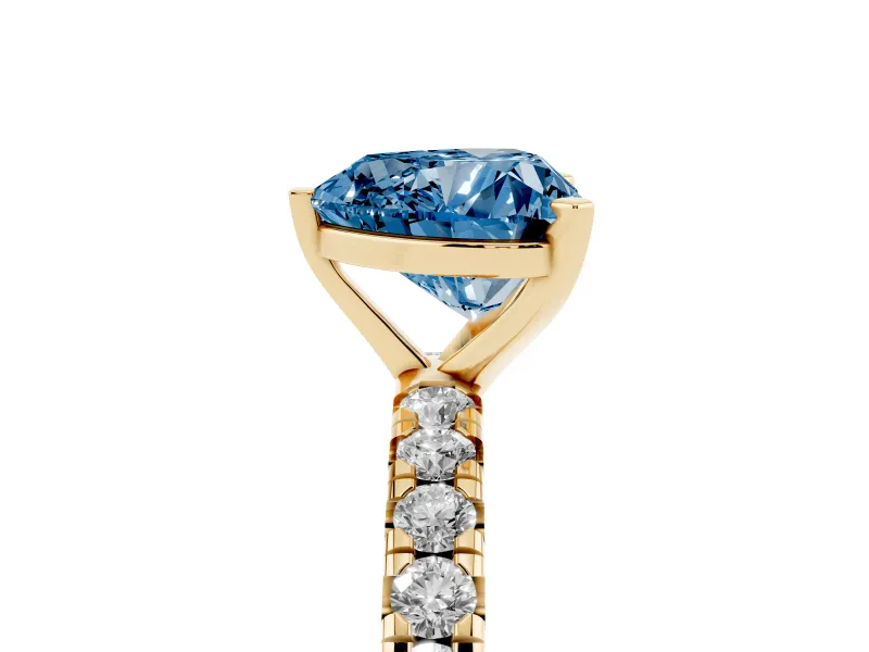 Fancy Blue Heart Cut Diamond Pavé Solitaire Ring Set in Yellow gold with Round Band and Prong Setting
