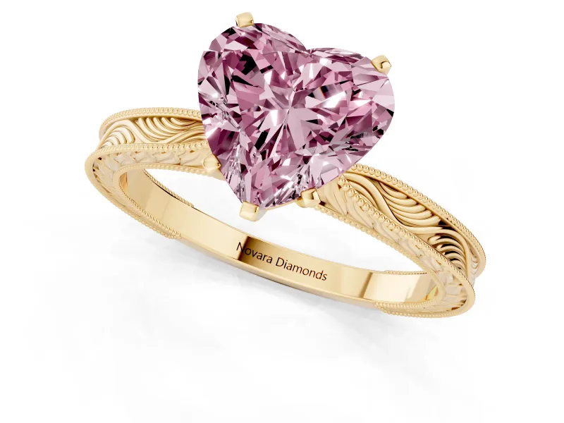 Fancy Pink Heart Cut Diamond Solitaire Milgrain Engraved Band Set in Yellow gold with Prong Setting