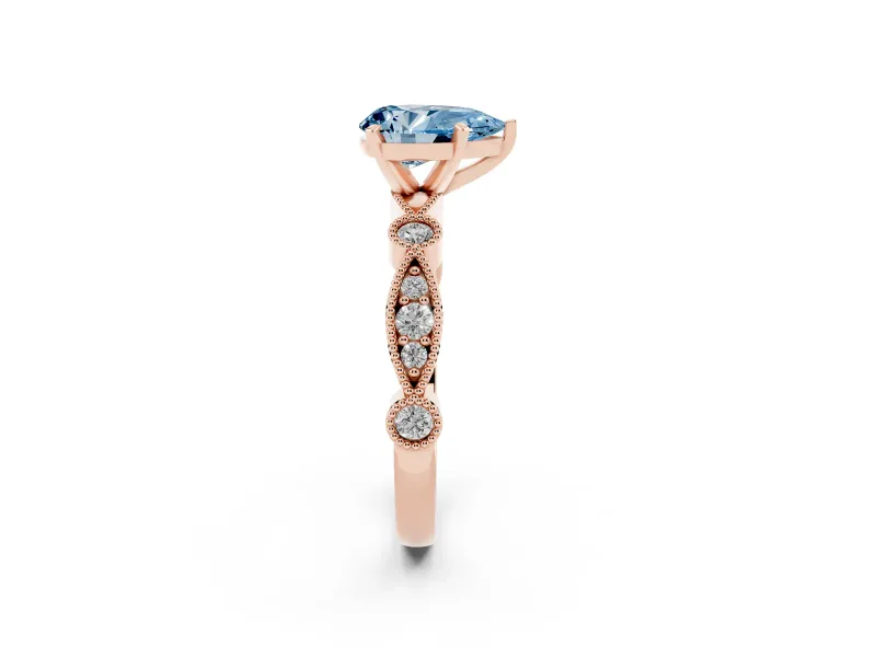 Fancy Blue Pear Cut Diamond Solitaire Engagement Ring Set in Rose gold with Milgrain Bezel Accent Band