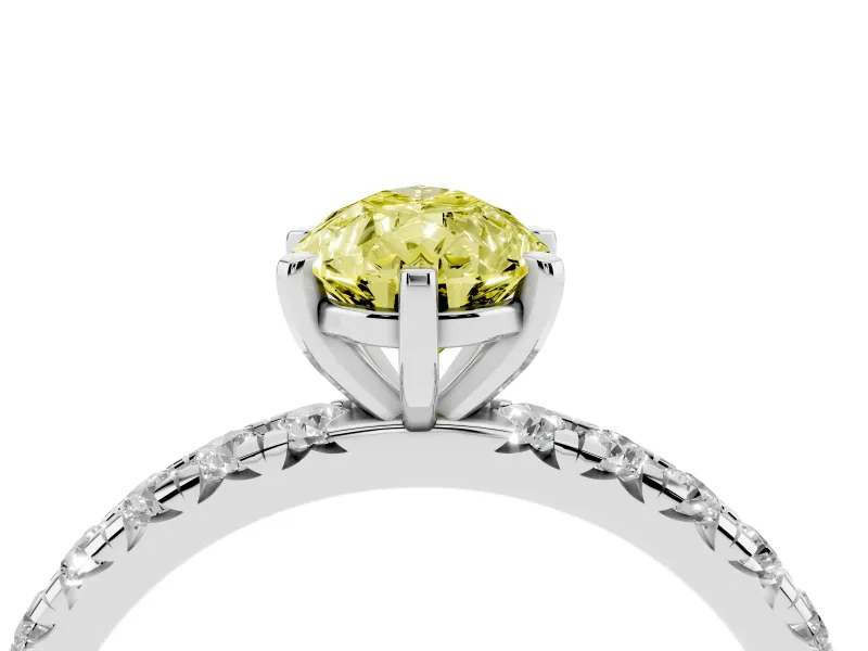 Fancy Yellow Pear Cut Diamond Pavé Solitaire Ring Set in White gold with Round Band and Prong Setting