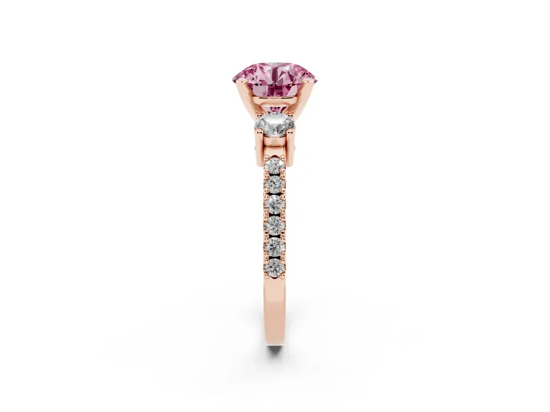 Fancy Pink Three-Stone Round Cut Diamond Pavé Band Ring Set in Rose gold with Prong Setting
