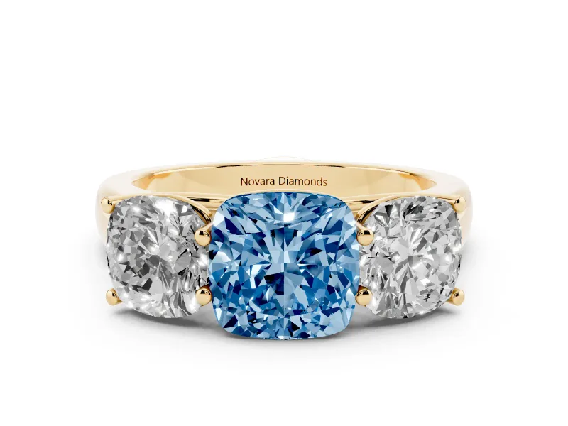 Fancy Blue Cushion Cut Diamond Three-Stone Ring Set in Yellow gold with Plain Polished Band