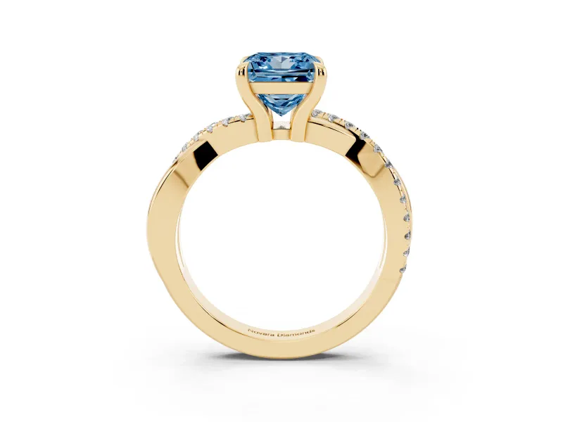 Fancy Blue Princess Cut Diamond Twist Band Solitaire Set in Yellow gold with Pavé Accents and Prong Setting