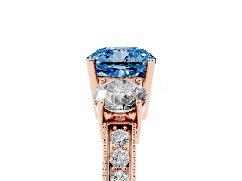 Fancy Blue Cushion Cut Diamond Three-Stone Ring Set in Rose gold with Round Side Stones and Pavé Band
