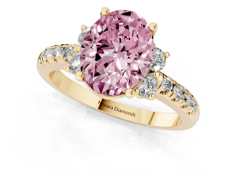 Oval Side Stone Engagement Ring Setting for a Fancy Pink Lab-Grown Diamond | Pave Band | Yellow Gold