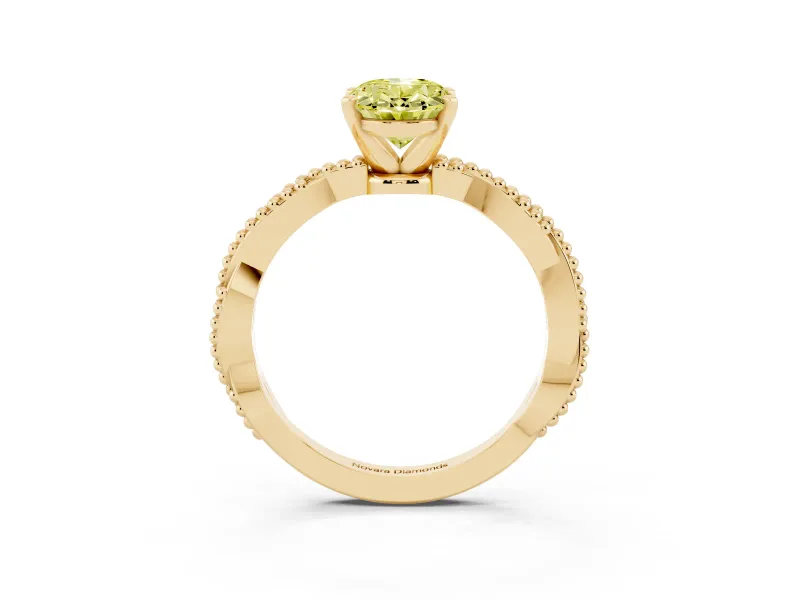 Fancy Yellow Oval Cut Diamond Solitaire Ring Set in Yellow gold with Twisted Band and Bead Prong Setting