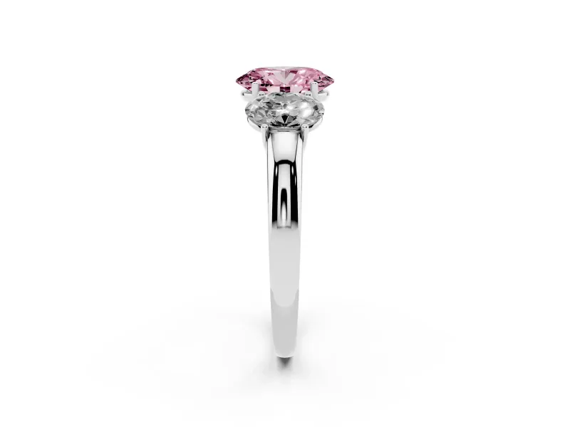 Fancy Pink Oval Cut Diamond Three-Stone Ring Set in White gold with Bold Center and Classic Band