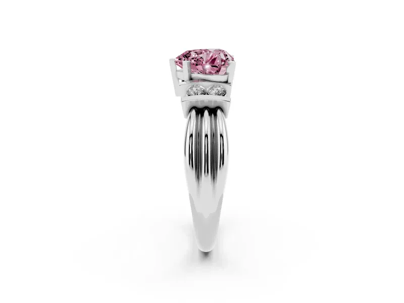 Fancy Pink Three-Stone Heart Cut Diamond Channel Set Ring Set in White gold with Bar Prongs