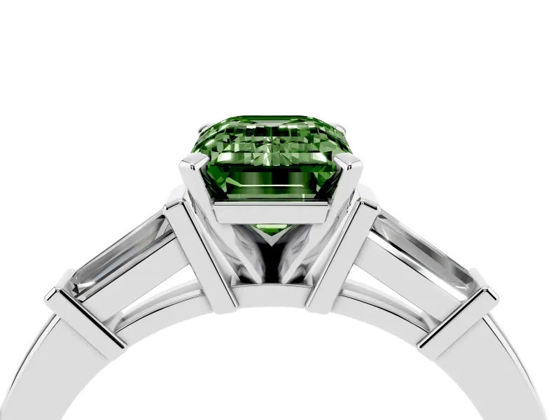 Fancy Green Emerald Cut Diamond Solitaire Ring Set in White gold with Tapered Baguette Accents and Prong Setting
